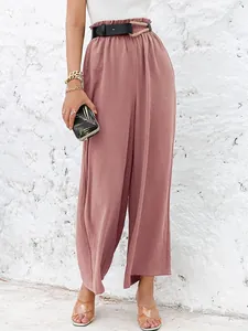 High-waisted wide-leg trousers in dusty rose with elastic ruffle waist and belt details