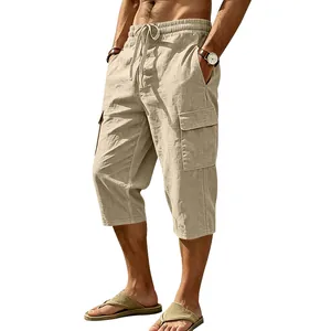 Close-up detail of khaki linen cargo cropped pants for men featuring drawstring waist