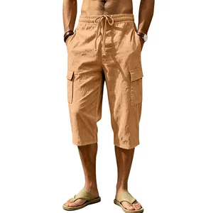 Men's casual summer linen cargo three-quarter pants in apricot with drawstring waist.