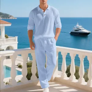 Light blue men's linen long sleeve polo shirt and matching trousers set for beach vacation
