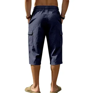 Detailed back view of men's navy blue linen cargo cropped pants for summer casual