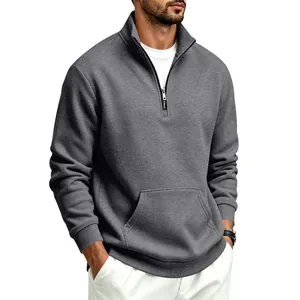 Men's dark grey half-zip fleece sweatshirt shown in a stylish studio shot.