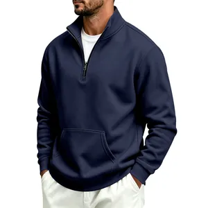 Detail view of navy blue men's half-zip sweatshirt featuring a stand collar and pocket