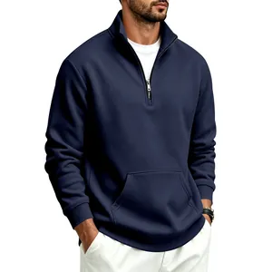 Detail view of men's navy blue half-zip sweatshirt with stand collar and pocket