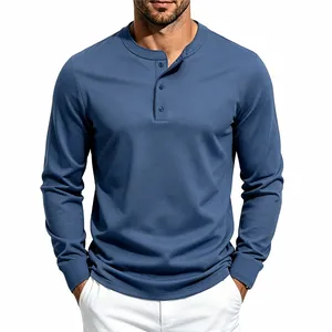 Close-up detail of men's dusty blue long-sleeved Henley shirt with button placket