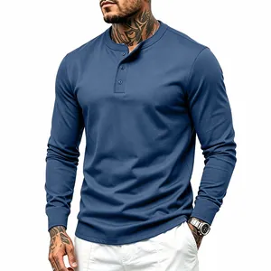 High-quality detail of men's blue long-sleeve Henley shirt featuring buttoned collar