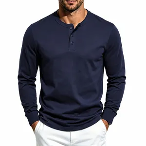 Detail of men's navy blue long sleeve Henley shirt with button placket