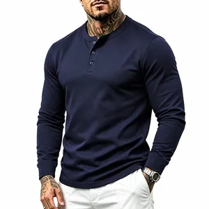 Detailed view of a navy blue long sleeve henley shirt with premium knit texture.