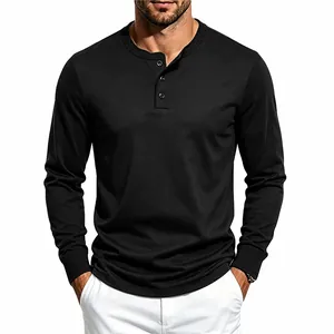 Close-up detail showing the classic button placket of a black long-sleeved Henley shirt for men