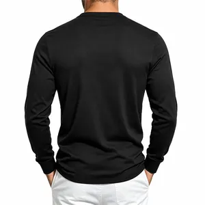 Detailed back view of a premium men's long sleeve black knit shirt with white pants.