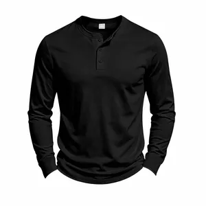 Detailed close-up of a men's black long-sleeved Henley shirt in premium knit fabric