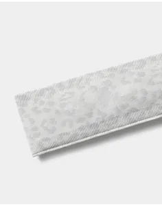 High-resolution detail of light gray seamless leopard print yoga headband fabric