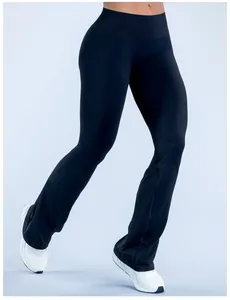Detail view of black seamless flared yoga pants with high waist for fitness and gym wear