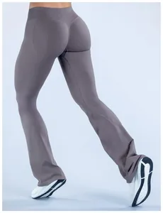Back view of seamless gray yoga flare pants showing flattering fit and flared hem.