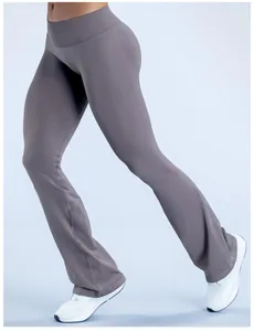 Detail view of women's seamless yoga flare pants in mocha grey showing the stylish cut