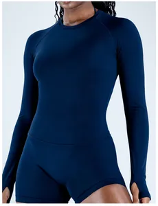 Close-up of navy blue seamless quick-dry long sleeve athletic top with thumb holes