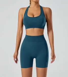 Seamless high-stretch yoga set featuring halter neck sports bra and high waist biker shorts