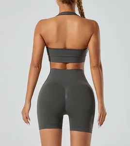 Rear view of seamless high-waist grey yoga set featuring halter sports bra and shorts