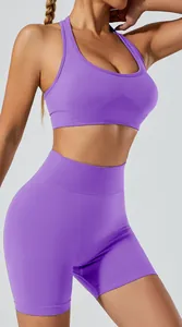 Detailed view of purple seamless high-stretch yoga set with halter sports bra and shorts.