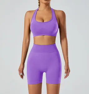 Full view of the purple seamless yoga set with halter sports bra and high-waisted shorts