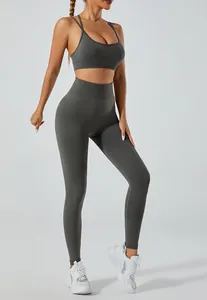 Full-body view of charcoal grey yoga set featuring high-waisted seamless leggings