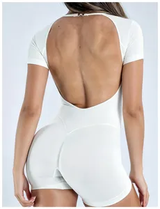 Detailed back view of a white backless athletic bodysuit for women's yoga and fitness.
