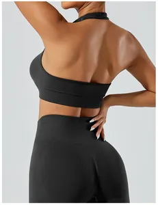 Back view of black ribbed halter neck sports bra and high-waist yoga leggings set