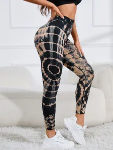 Detailed side view of high-waisted tie-dye yoga leggings featuring tummy control and lift