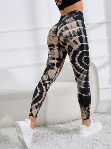 Detailed view of high waisted tie-dye yoga leggings with scrunch butt lifting design