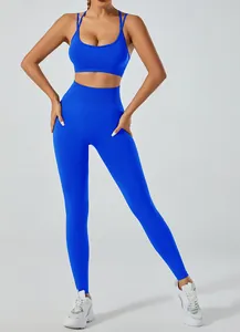 Detailed view of vibrant blue two-piece yoga set with high-waist leggings