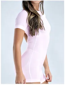 Side view detail of light pink backless quick-dry yoga bodysuit for fitness and Pilates.