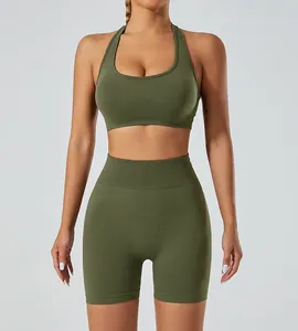 Front view of seamless olive green yoga set with halter sports bra and high-waist shorts