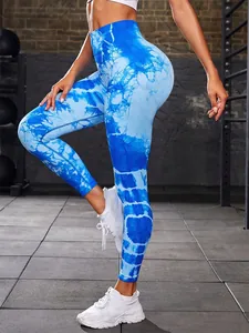 High-waisted blue tie-dye yoga leggings for women's fitness, running and workouts.