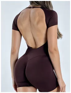 Back view of brown backless one-piece yoga jumpsuit showing fit and fabric texture