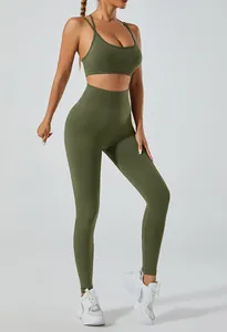 Full body side view of olive green high-waist yoga leggings and matching sports bra set