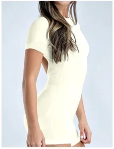 Close-up side view of a cream high-elastic short sleeve backless yoga romper for women