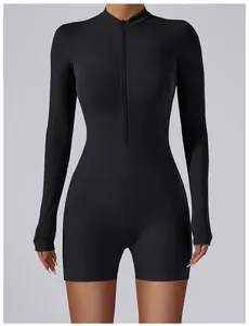 Professional slim fit black long-sleeved yoga bodysuit with a functional front zipper closure