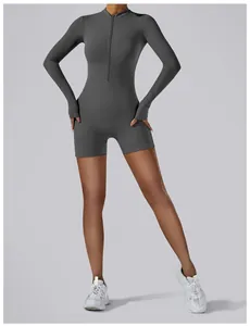 Grey long-sleeve zip-front yoga bodysuit with thumbholes for workout and fitness