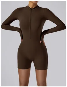 Slim fit brown long-sleeve yoga bodysuit featuring a mock neck and front zipper detail.