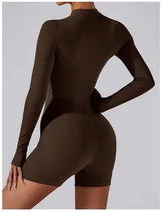 Rear view detail of brown long sleeve yoga bodysuit showing tight athletic fit