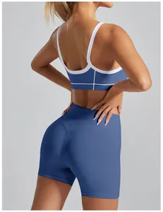 A detailed rear view of blue high-waisted yoga shorts and sports bra fitness set.