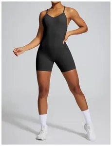 High-resolution detail of seamless black fitness yoga romper with v-neck and slim straps.