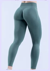 Detailed back view of seamless high-waisted yoga leggings with scrunch butt design in teal green