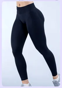 High waist seamless black yoga pants with butt lifting design for fitness and training sessions.