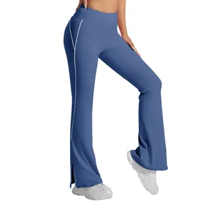 Professional high-waisted yoga flare pants with side split and white piping in dusty blue finish