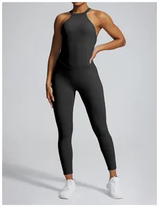 Close-up of a black backless yoga jumpsuit with flattering waist and hip-sculpting fit.