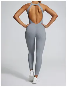 Detail view of a grey backless yoga jumpsuit with scrunch butt effect for fitness