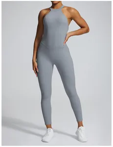 Detailed view of a grey halter neck yoga jumpsuit with a body-sculpting and tight fit