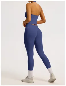 Detailed back view of a seamless blue yoga set with ribbed leggings and a halter top
