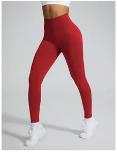 Detailed view of red high-waisted seamless peach lift yoga leggings for women fitness